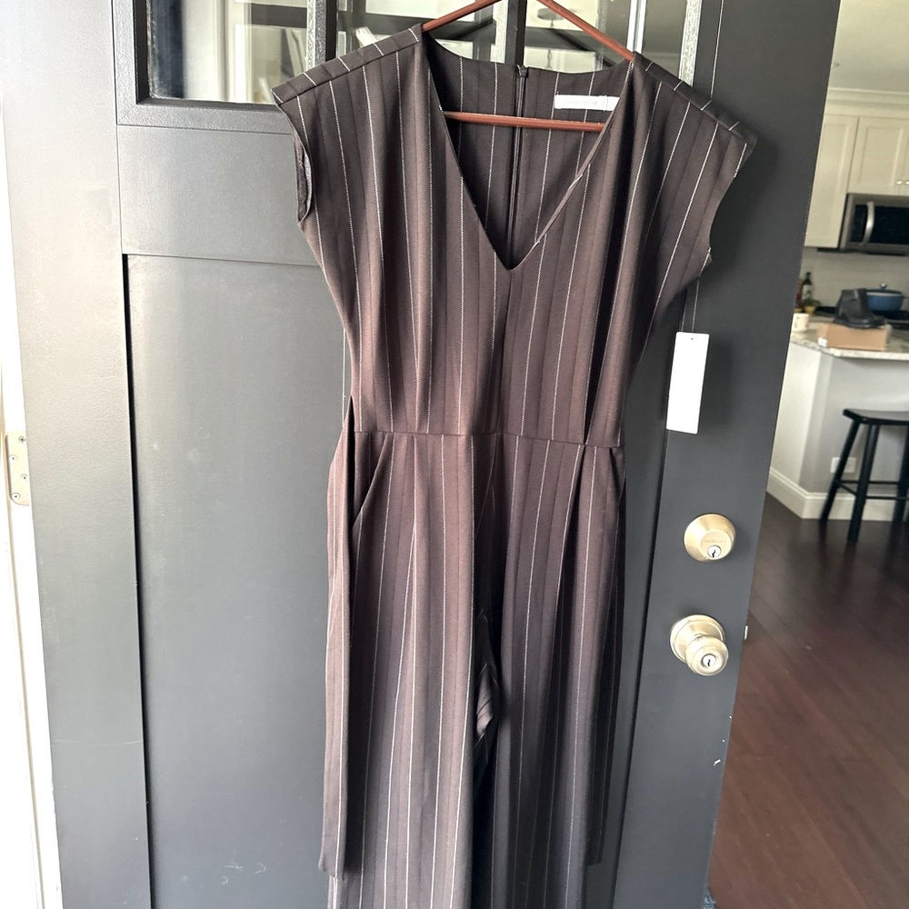 Black strip capri one piece by Bishop &young